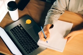 young-woman-studying-online-courses-with-a-laptop-2022-10-31-21-30-11-utc